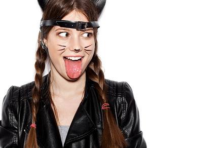 Funny girl represents as small cat having fun stock photo containing, a Person Photo by Aliaksei Kaponia