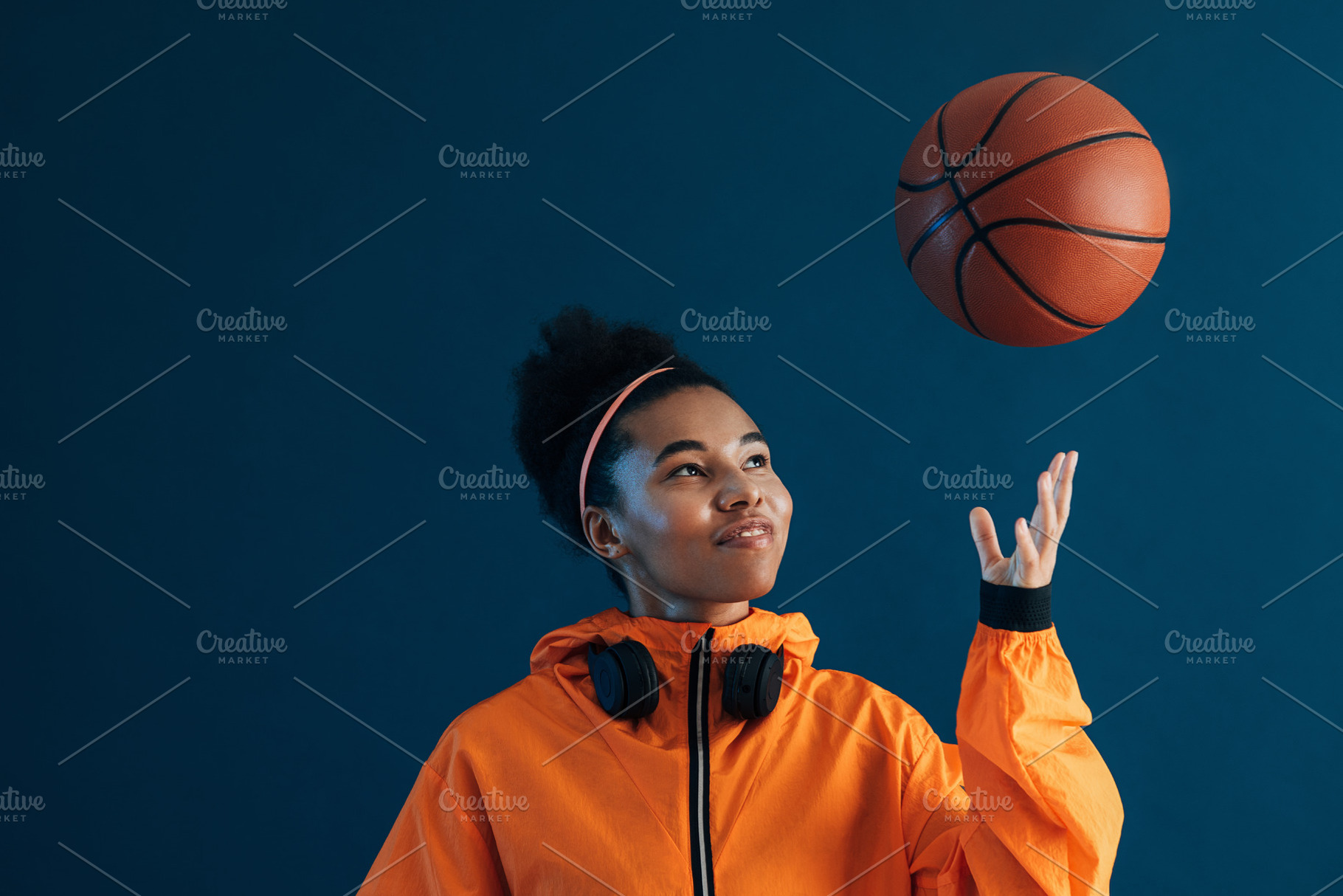 Cheerful female in orange fitness, a Sports & Recreation Photo by Artem Varnitsin