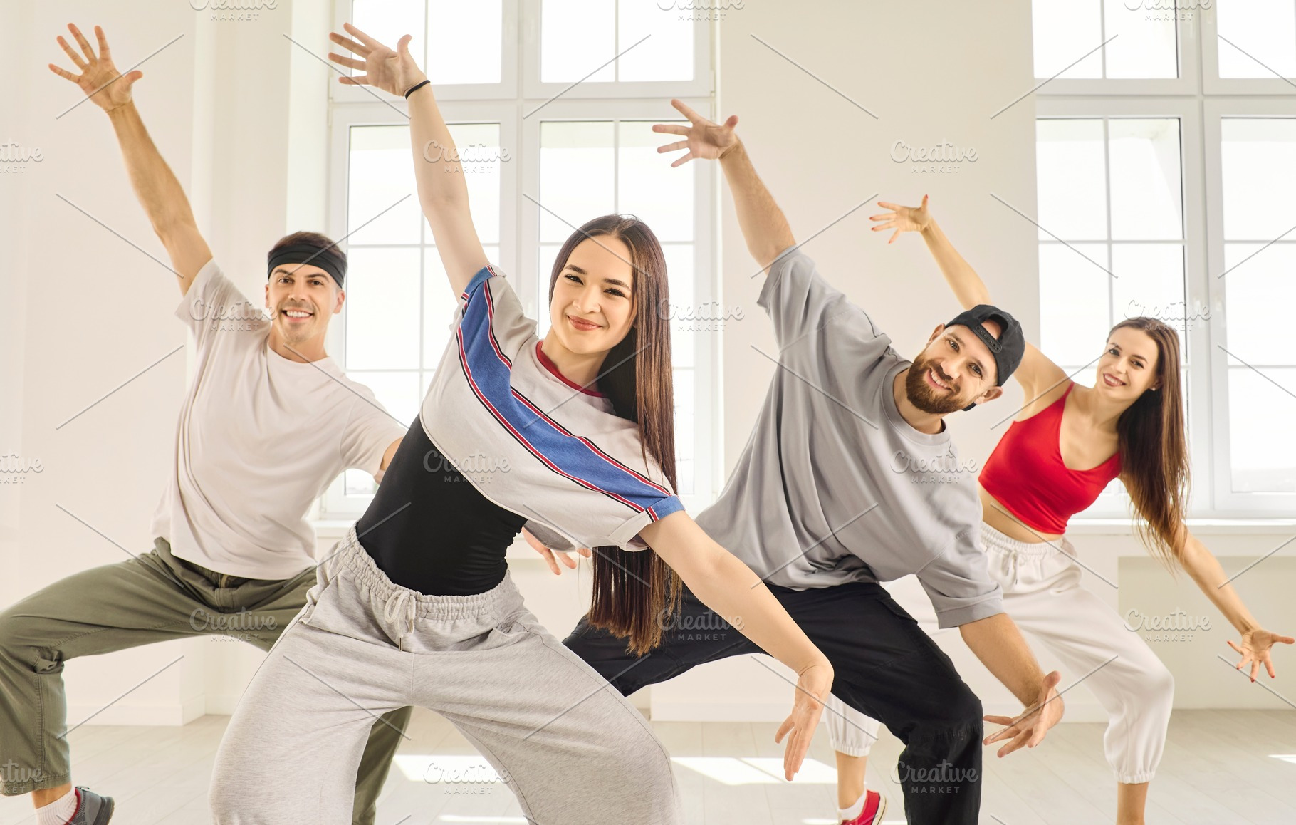 Four Dancers in Synchronized Routine, a Person Photo by StudioRomantic