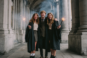 Happy graduates celebrating with spa, a Photo by Pixeness Studio