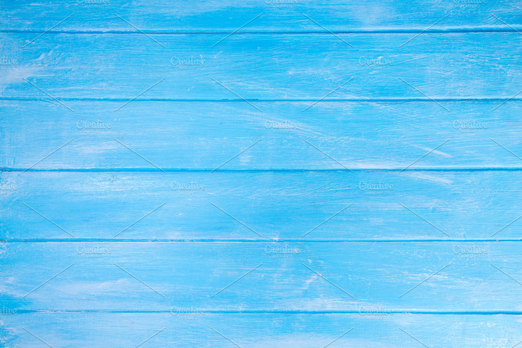 Light blue wooden background, an Abstract Photo by Rimma