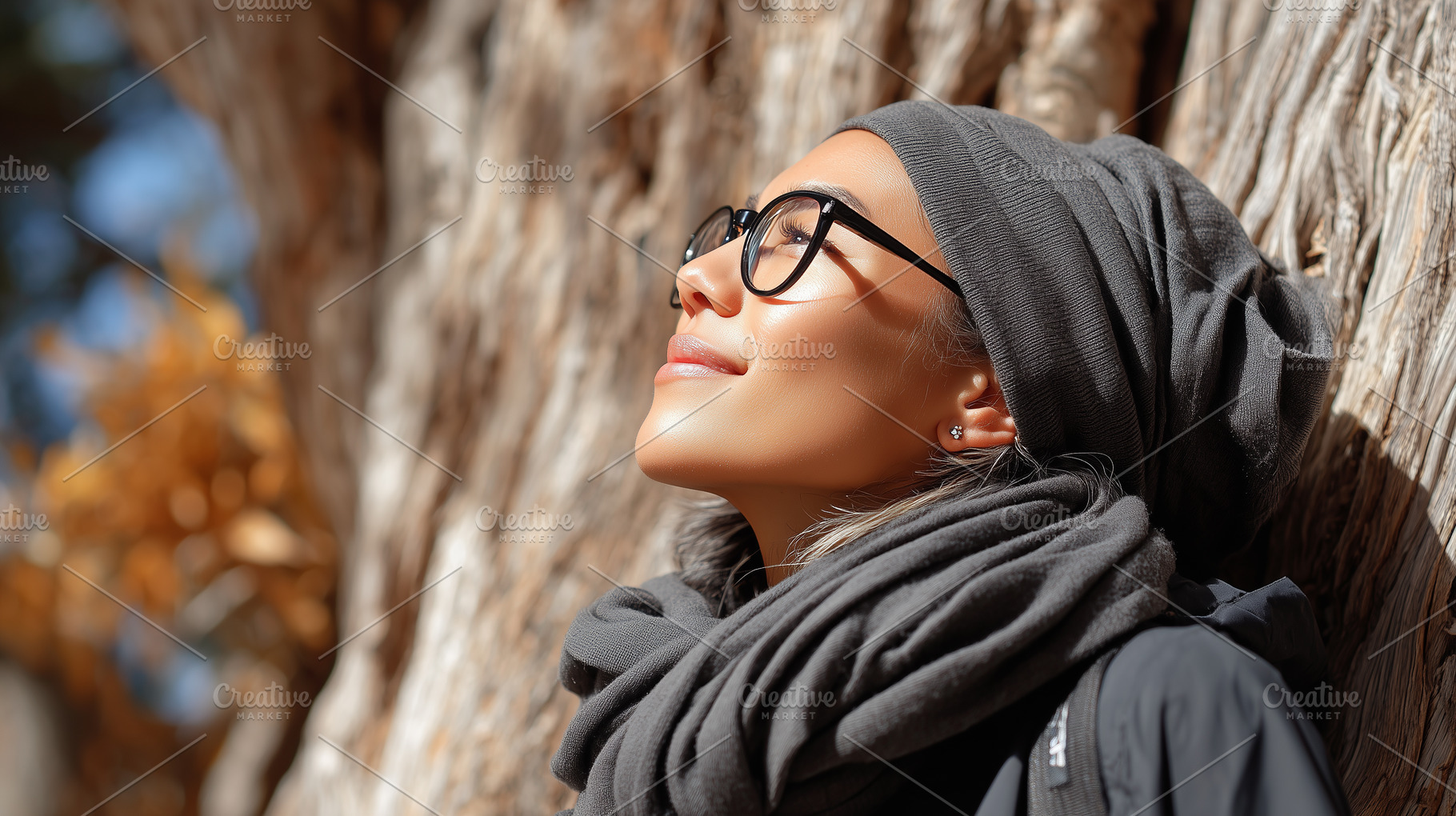 Young woman in glasses and a scarf, a Person Photo by MistyDay
