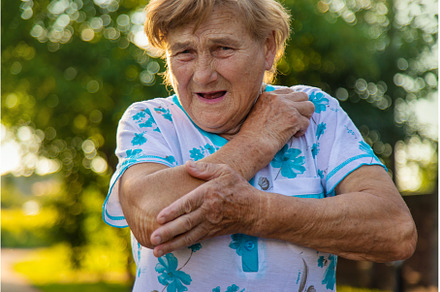 Old woman arm hurts, elbow, a Health & Medical Photo by yanadjana