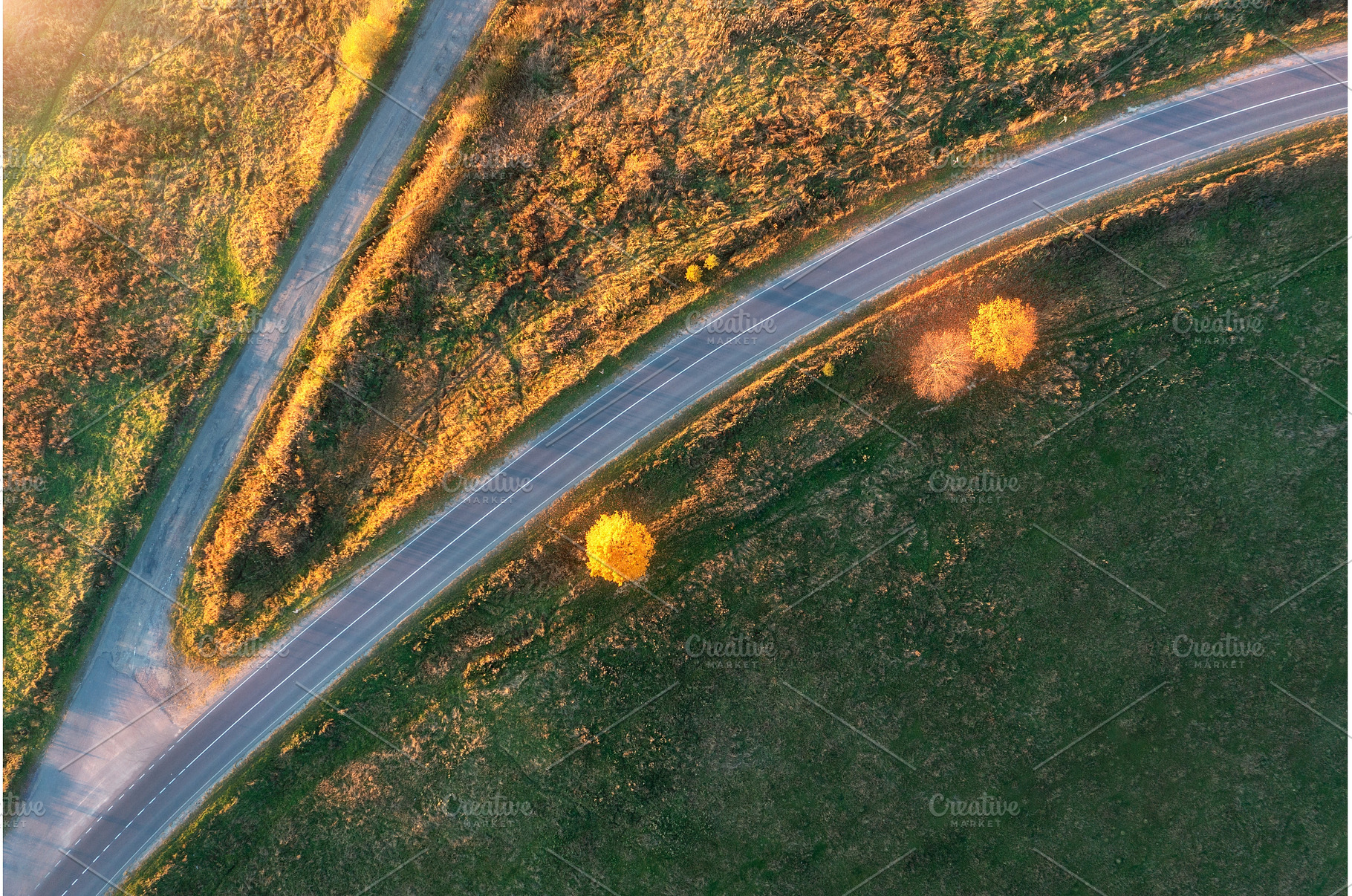 Aerial view of winding road in, a Transportation Photo by den-belitsky