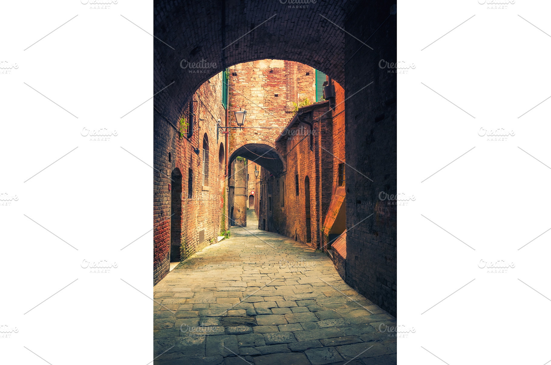 Narrow street in Siena Tuscany, an Architecture Photo by sborisov