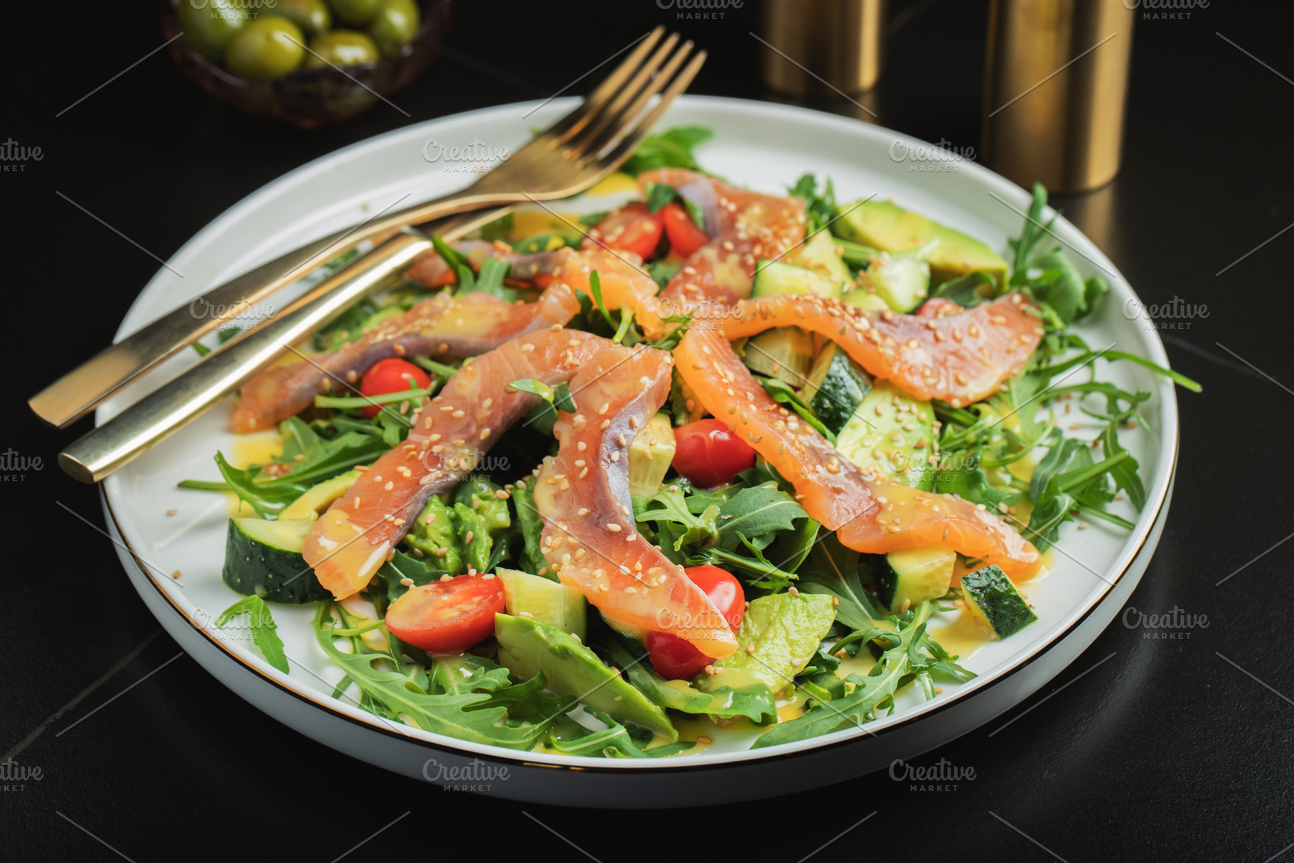 Salad with salted salmon and arugula, a Food & Drink Photo by Budarinphoto