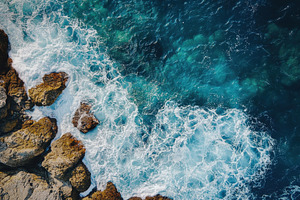 Aerial view of a blue ocean waves, a Photo by Pavel_design