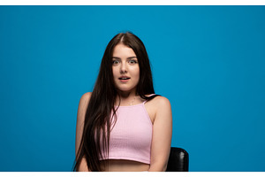 Young woman looking directly at the, a Person Photo by volodymyrshtun13795