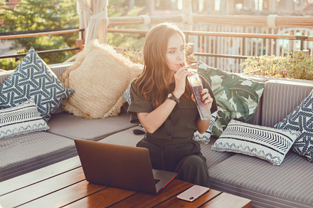 Women using laptop and phone stock photo containing woman and laptop, a Technology Photo by Travelman