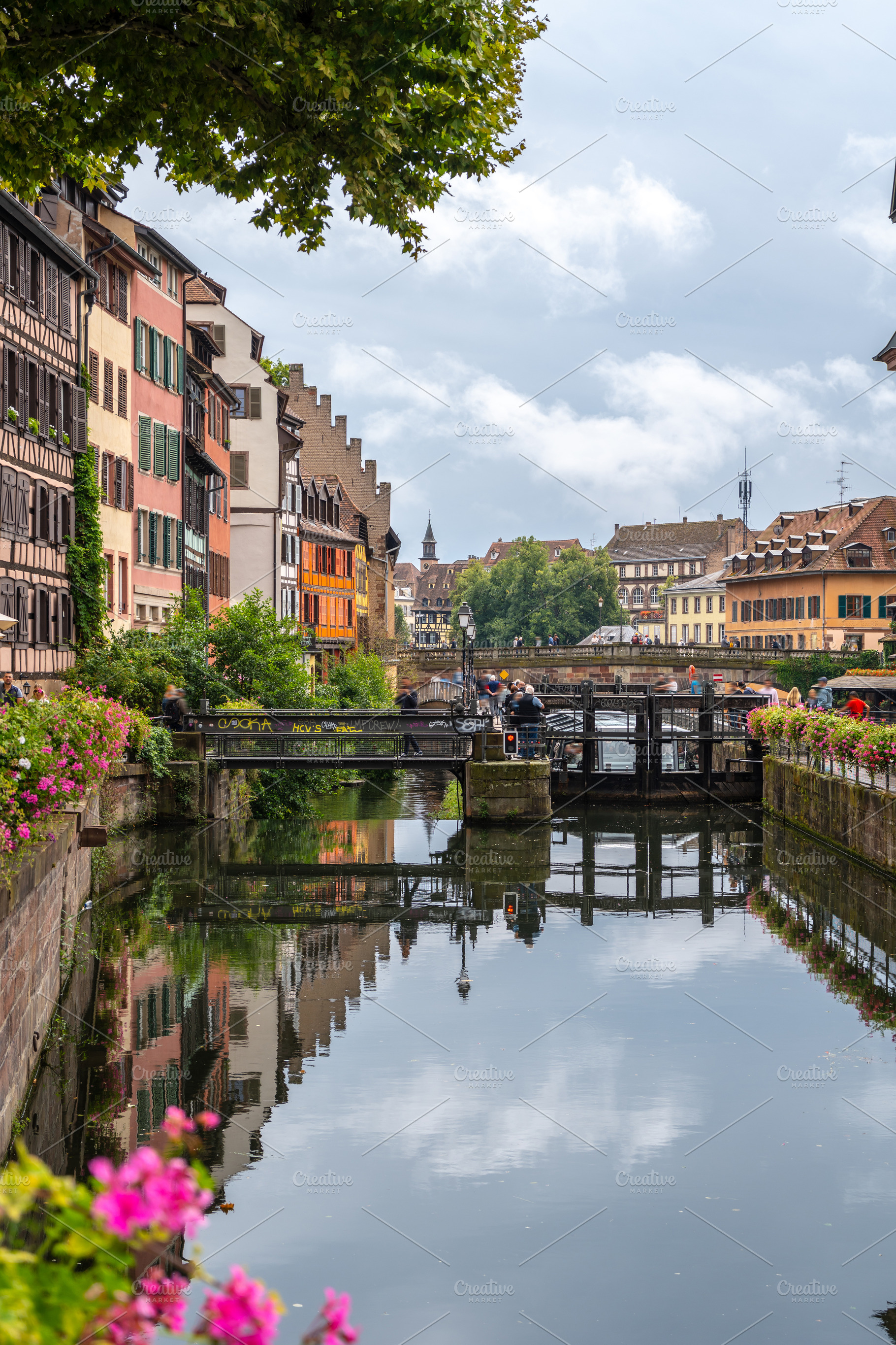 Canal bridge and colorful buildings in Strasbourg France, an Architecture Photo by GoodGoods