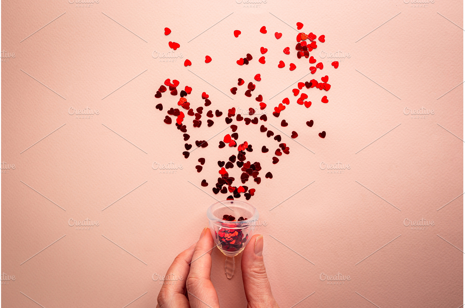 Menstrual cup on pink, a Health & Medical Photo by piter.goskov