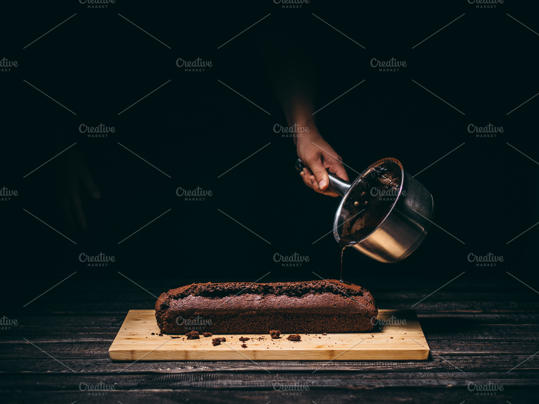 Pouring chocolate on a cake, a Food & Drink Photo by Pawel Kadysz