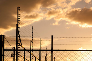 Sunset Fence, an Industrial Photo by THP Creative