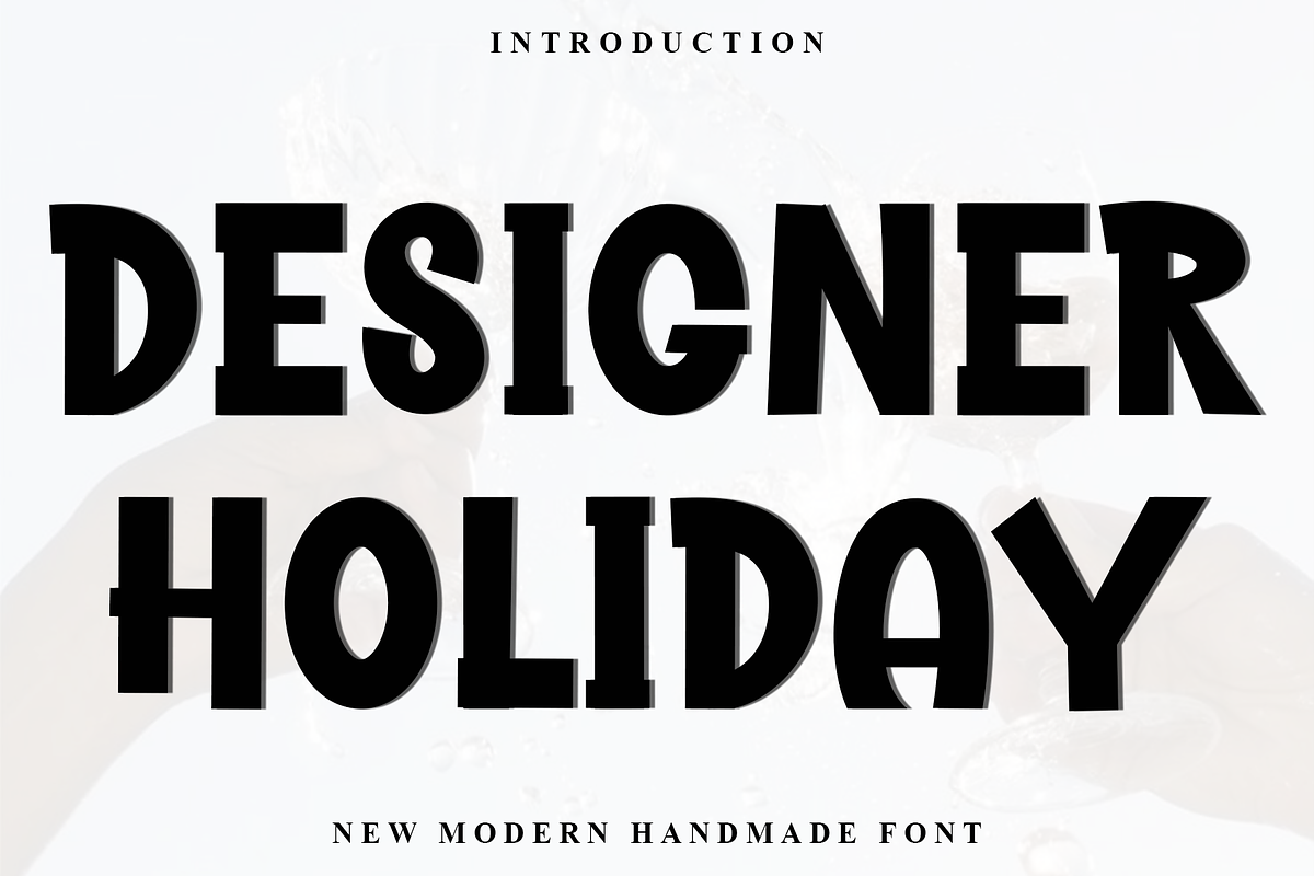 Designer Holiday, a Script Font by InermediaSTUDIO (Photo 1 of 8)