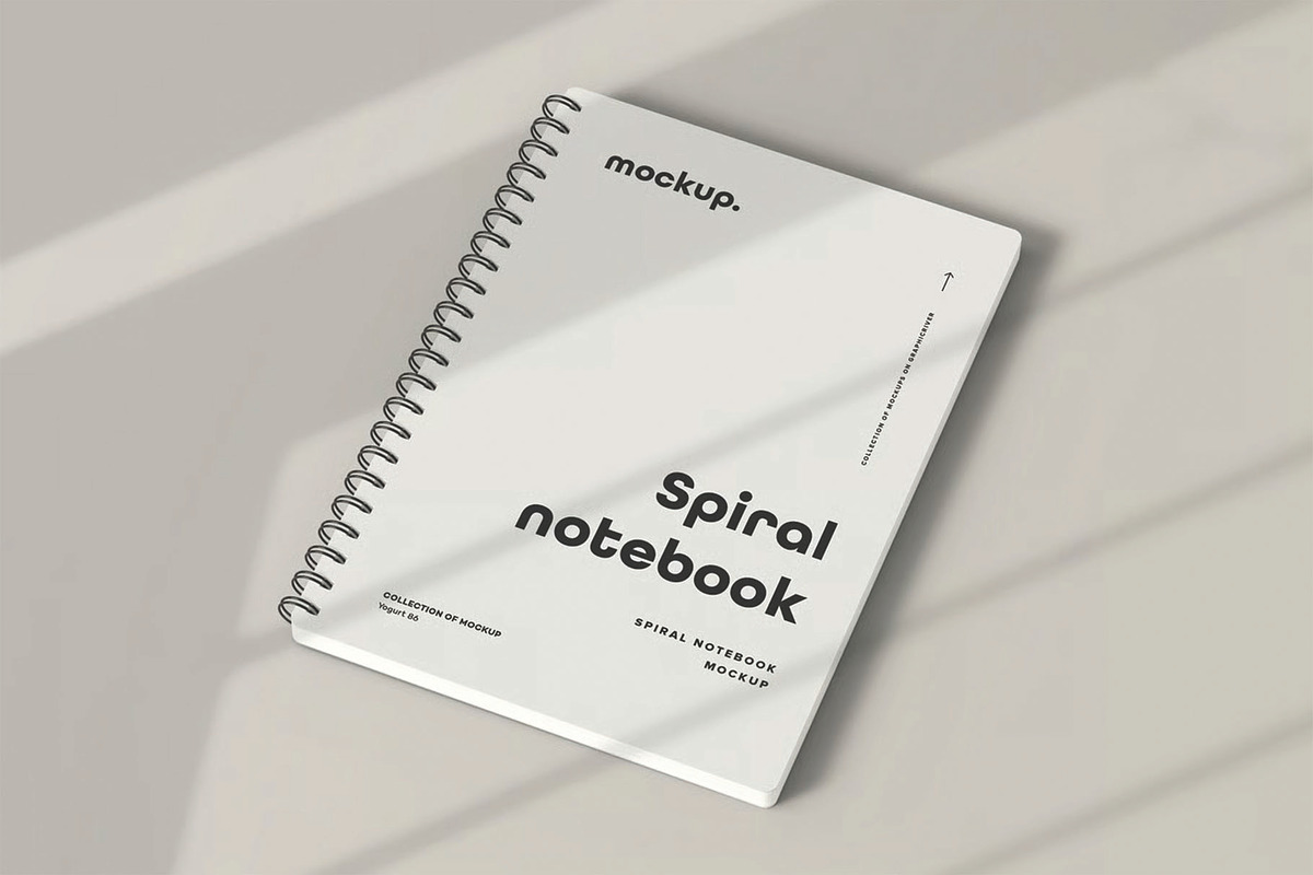 Spiral Notebook Mockup, a Books & Magazine Mockup by DesignRushMarket (Photo 2 of 2)