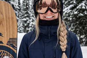 Happy Female Snowboarder with Gear, a Sports & Recreation Photo by Virgo Studio