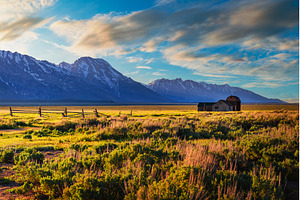 Sunset over a historic farm at