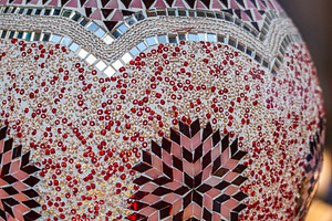 Close up of beautiful mosaic lamp, an Architecture Photo by Anna Bogush