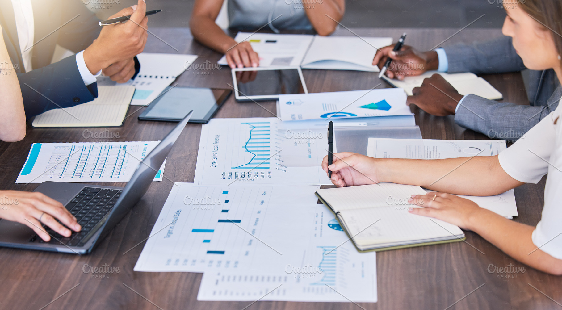 Sales, budget and finance business people, manager or accountants in meeting planning, analyzing and discussing paper work, charts and graphs data. An accounting company working on commerce analysis, a Photo by Peopleimages.com