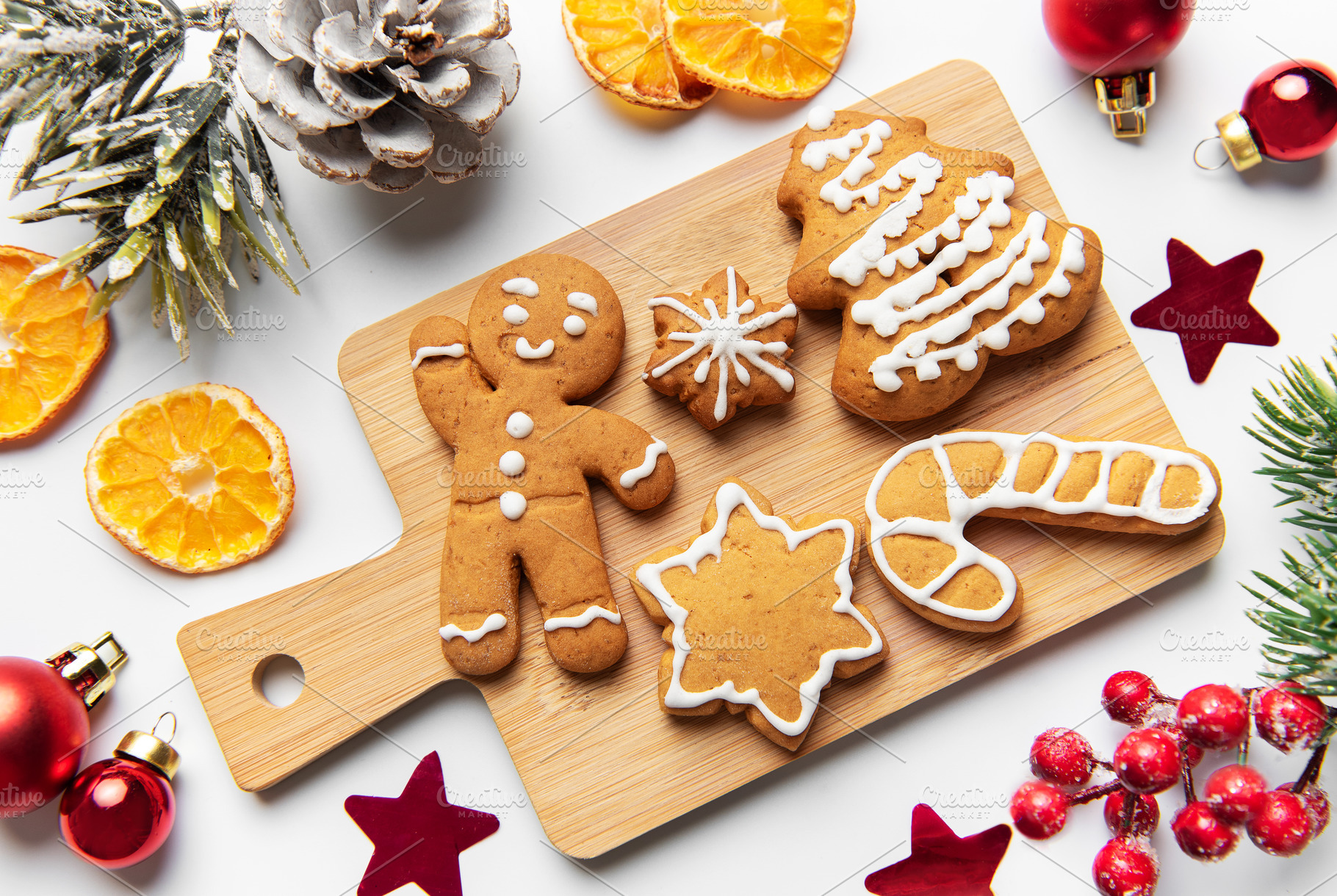 Gingerbread cookies arranged on cutting board with christmas dec, a Holiday Photo by Olena Rudo