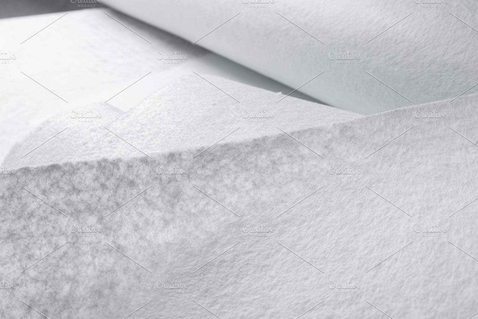 White Geotextile Fabric Sheets with Visible Texture, Close-Up, an Industrial Photo by MDBildes