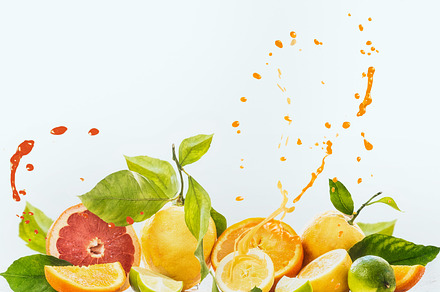 Citrus fruits with juice splash, a Food & Drink Photo by VICUSCHKA