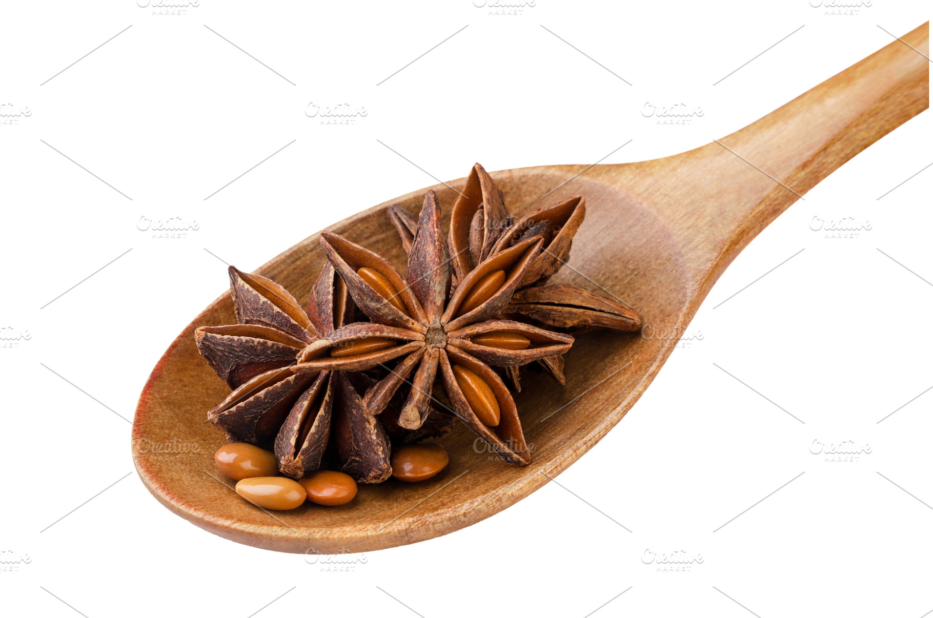 Star anise with seeds in a wooden, a Food & Drink Photo by innakreativ