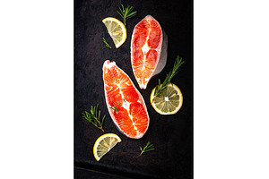 Raw uncooked salmon with rosemary, a Food & Drink Photo by Yulia Furman