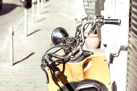 Close-up photo of retro scooter, a Transportation Photo by kirill.makes.pics
