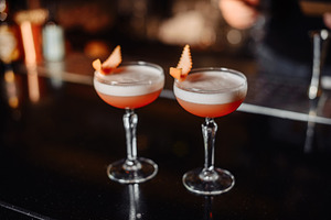 Two orange cocktails stock photo containing alcohol and bar