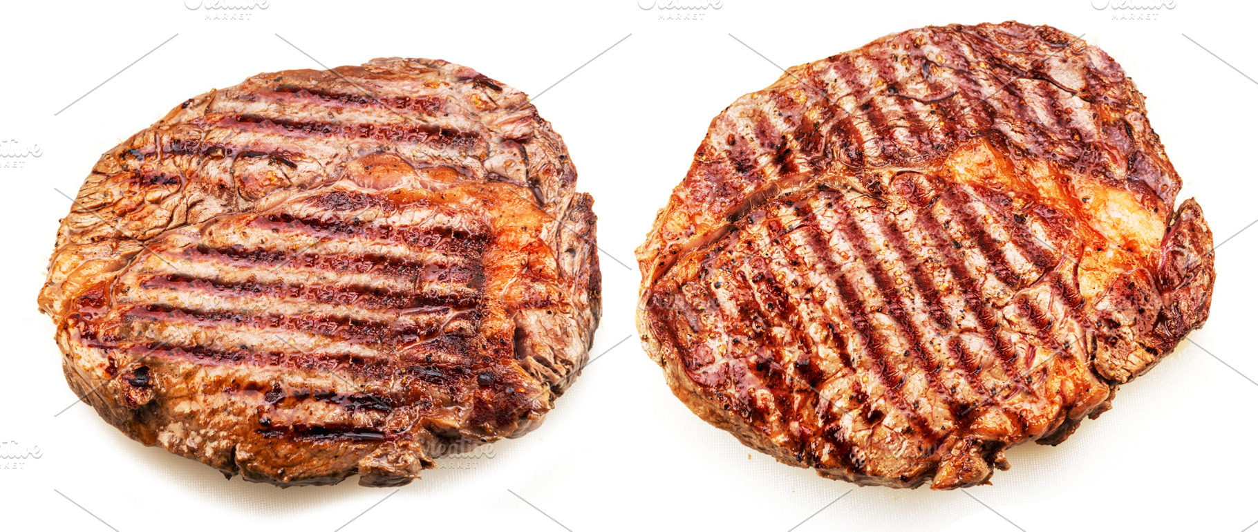 Two grilled ribeye steaks isolated on white background., a Food & Drink Photo by Volff