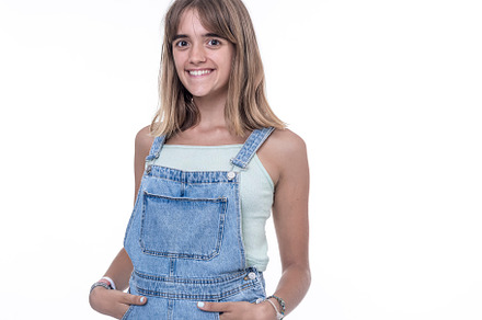 woman standing with hands in pockets, wearing Texan jumpsuit, a Person Photo by 2Design