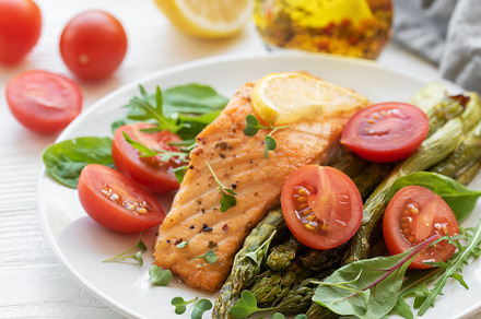 Baked Delicious salmon, green asparagus on  plate, a Food & Drink Photo by Olena Rudo