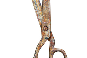 Old rustic tailor scissors isolated, an Industrial Photo by BOOCYS