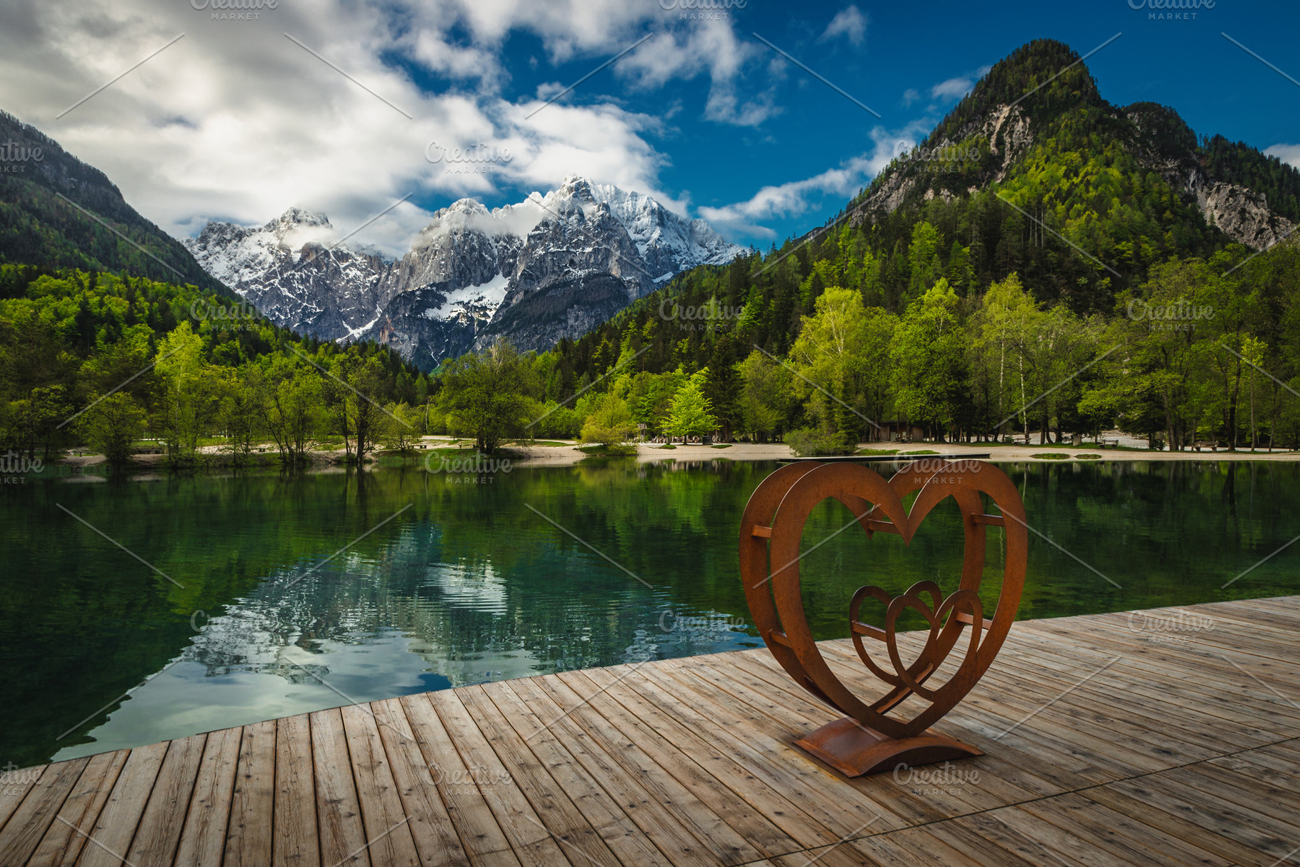 Symbol of the love on the pier, a Nature Photo by Alpine Dreams