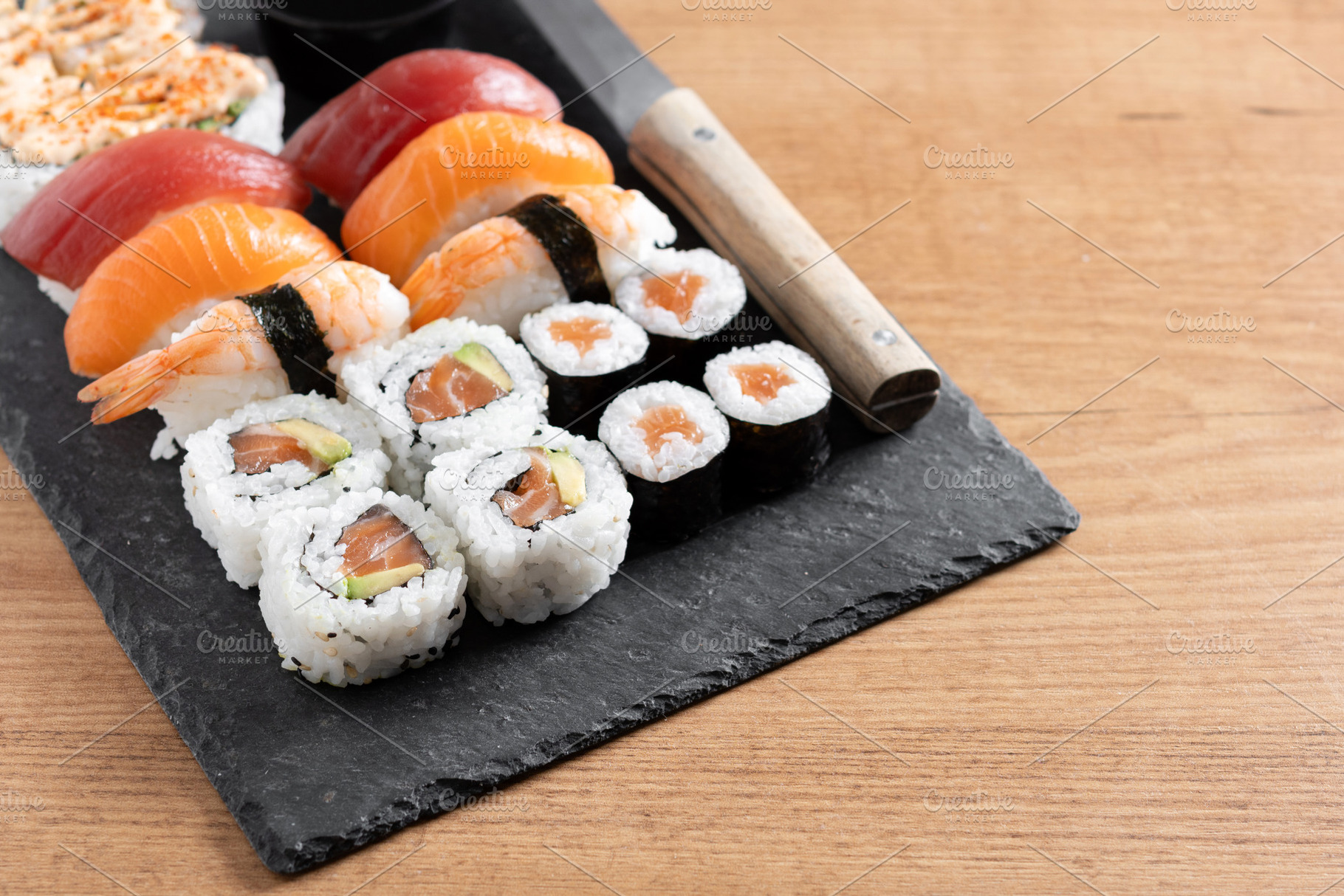 Fresh sushi assortment with salmon maki and nigiri, a Food & Drink Photo by etorres69