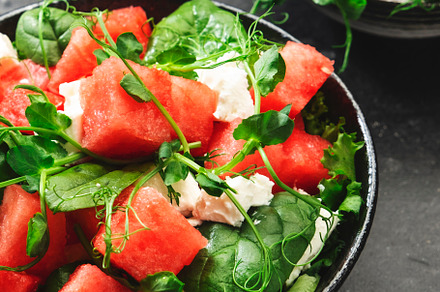 Watermelon salad bowl with soft goat cheese, spinach and pea spr, a Food & Drink Photo by 5PH