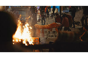 Tourists watching for fire during a, an Architecture Photo by Our Amazing World