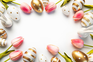 Easter eggs tulips and bunnies creating festive border, a Holiday Photo by Olena Rudo