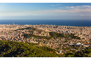 View of Barcelona including Sagrada Familia and Torre Agbar, an Architecture Photo by Leonid Andronov