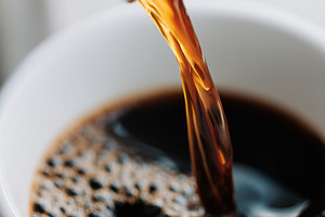 Freshly brewed coffee being poured, a Food & Drink Photo by MistyDay