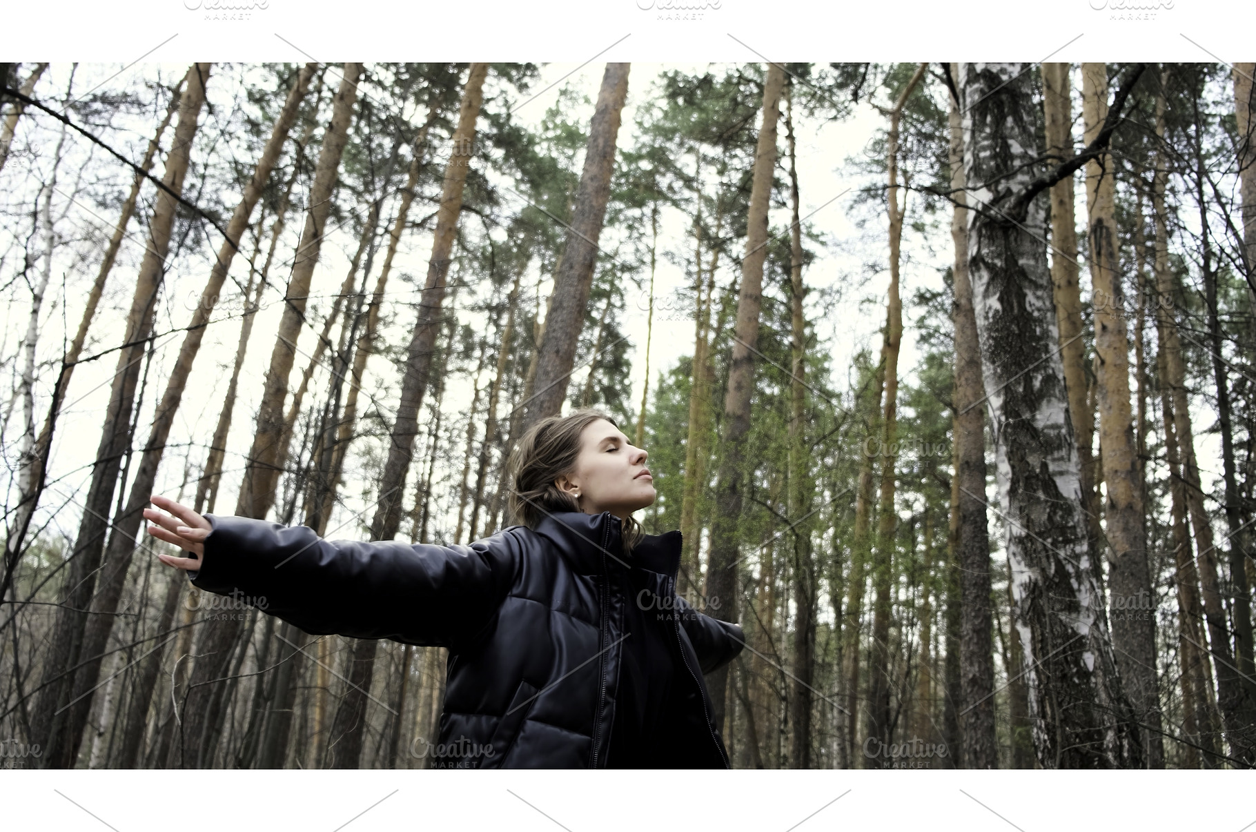 Beautiful woman hiking in the forest, a Nature Photo by Media Whale Stock