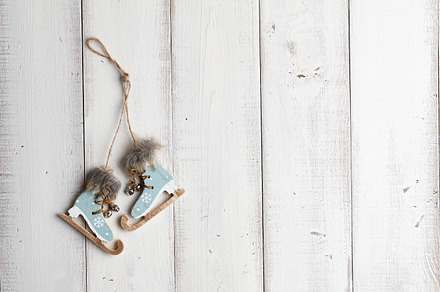 Christmas decoration on wooden background featuring skates, decoration, and, a Holiday Photo by Foodie's Shop