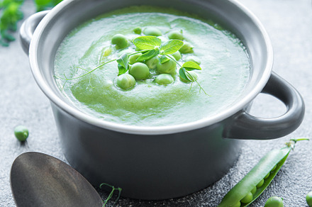 Fresh vegetable soup made of green peas, a Food & Drink Photo by Olena Rudo