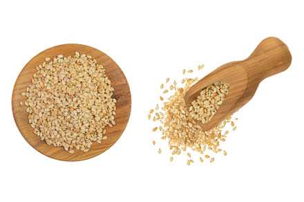 Sesame seeds in wooden bowl and, a Food & Drink Photo by NataPhoto