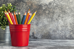 Wooden colorful rainbow pencils in bucket on wooden table, a School & Education Photo by AlyaAnd