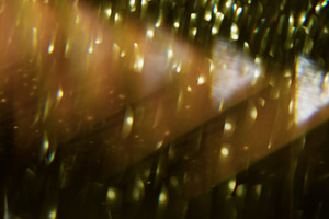 Triangle flicker defocused sparks light flare dark, a Background Photo by Photo Drive Studio