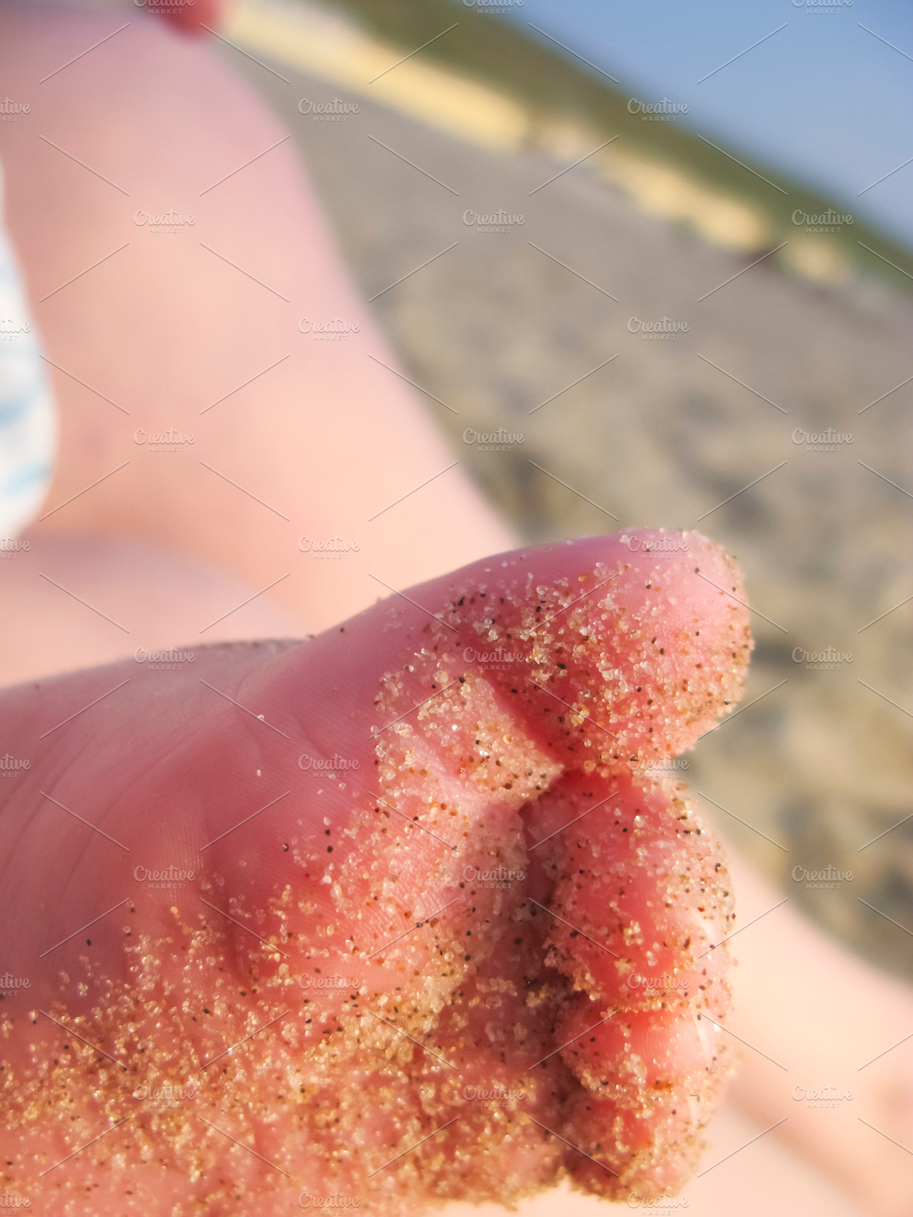 Sandy baby foot portrait featuring baby, foot, and sand