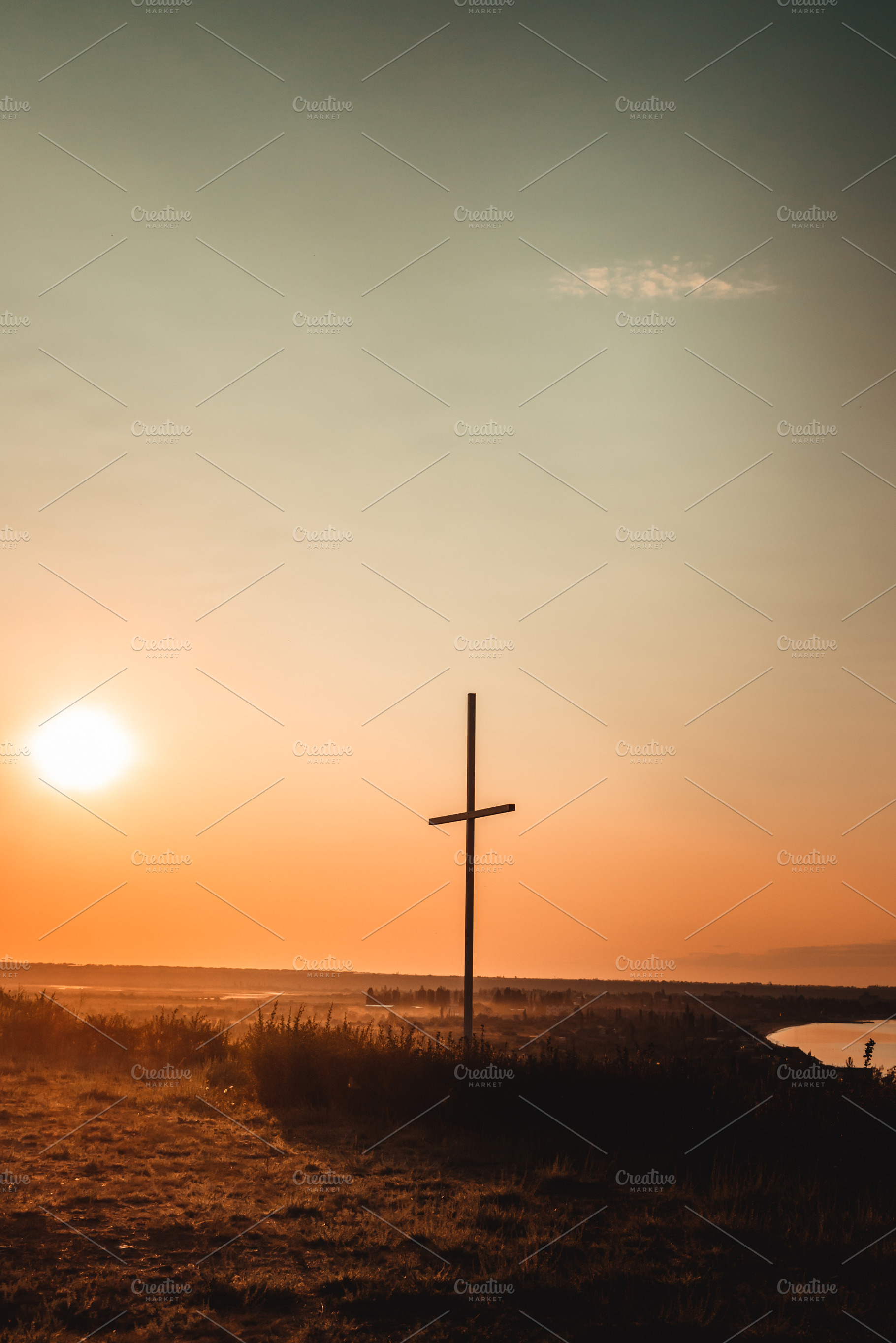 Cross christian featuring shapely, symbol, and dusk, an Abstract Photo by E+A Store