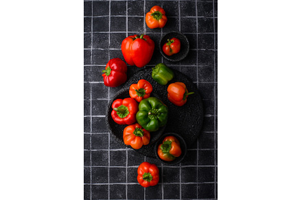 Colorful bell pepper on black, a Food & Drink Photo by Yulia Furman